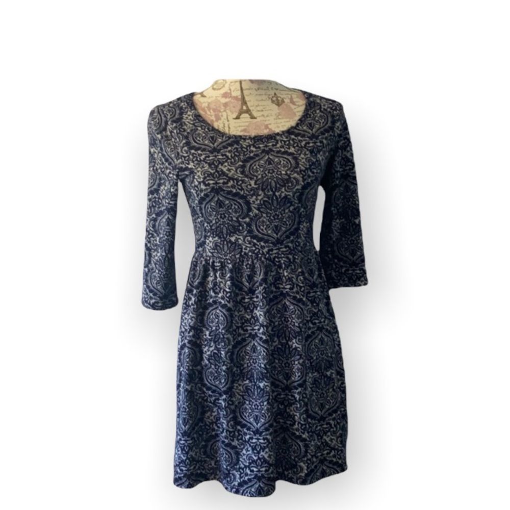 Speechless floral in blue dress.
